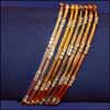 Fancy Bangles with shiny white stones - Click here to View more details about this Product